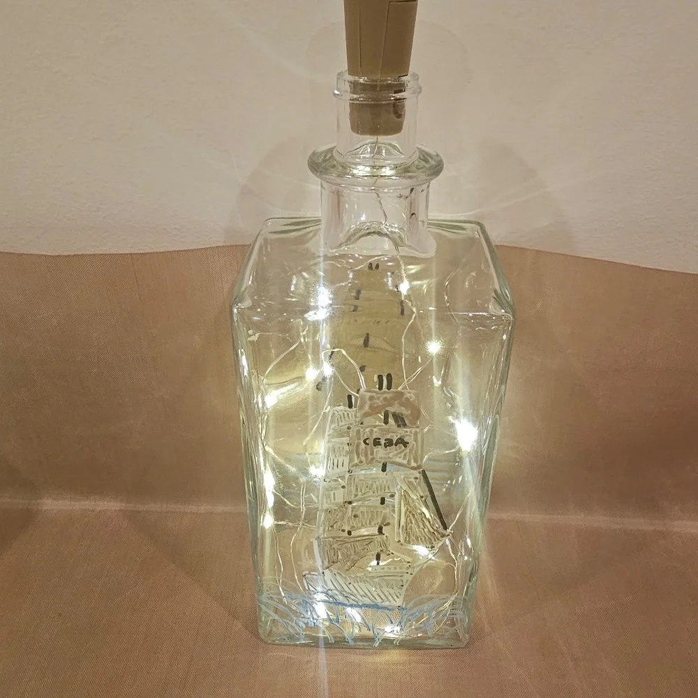 Liquor bottle with cork lights